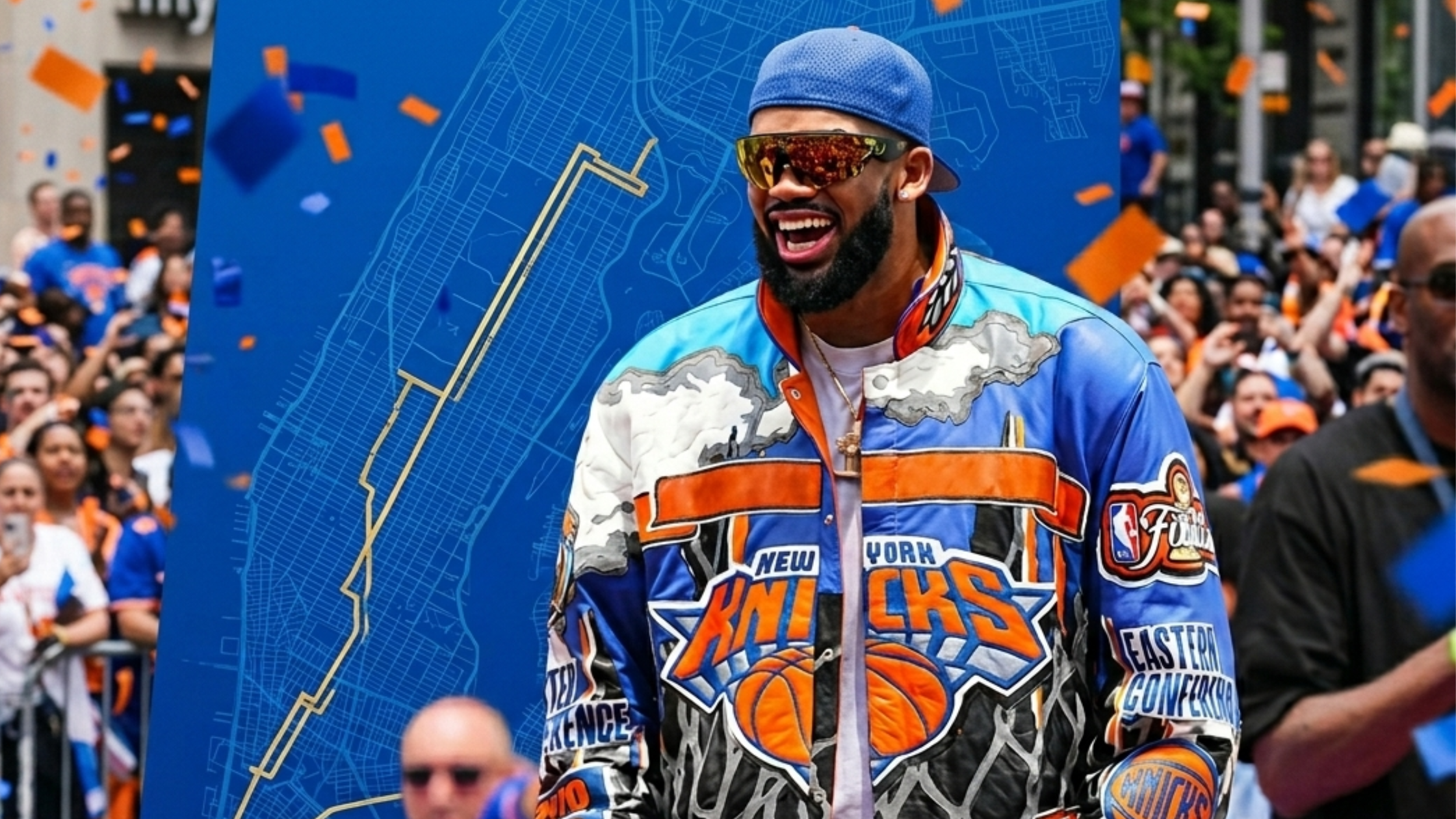 Karl-Anthony Towns New York Knicks Championship Parade & Ceremony 2026 multicolor leather varsity jacket featuring royal blue, orange, black, and gold accents with championship patches and premium detailing.