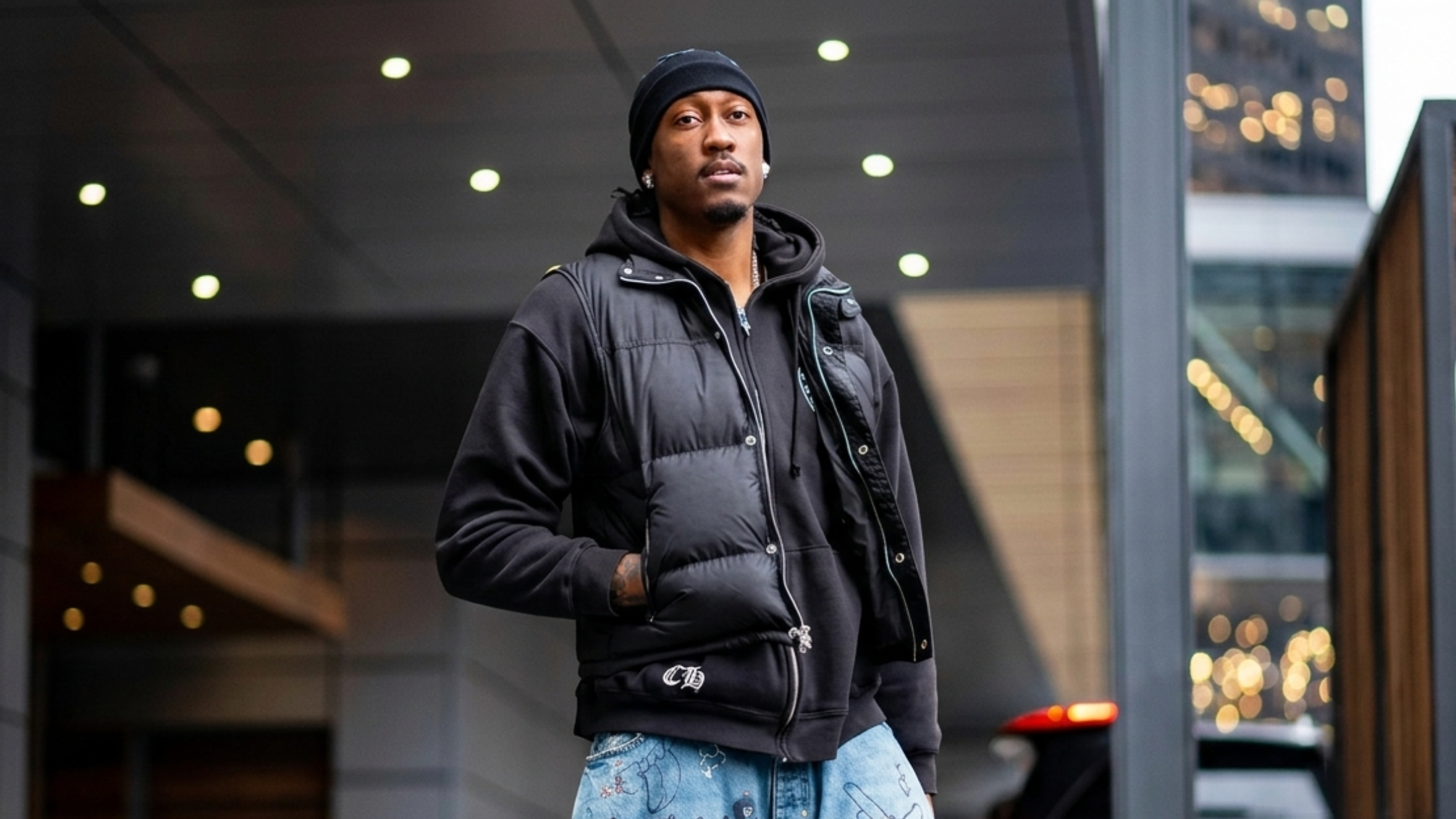 Jalen Williams Philadelphia 2026 black quilted puffer vest with funnel neck collar and silver snap button details