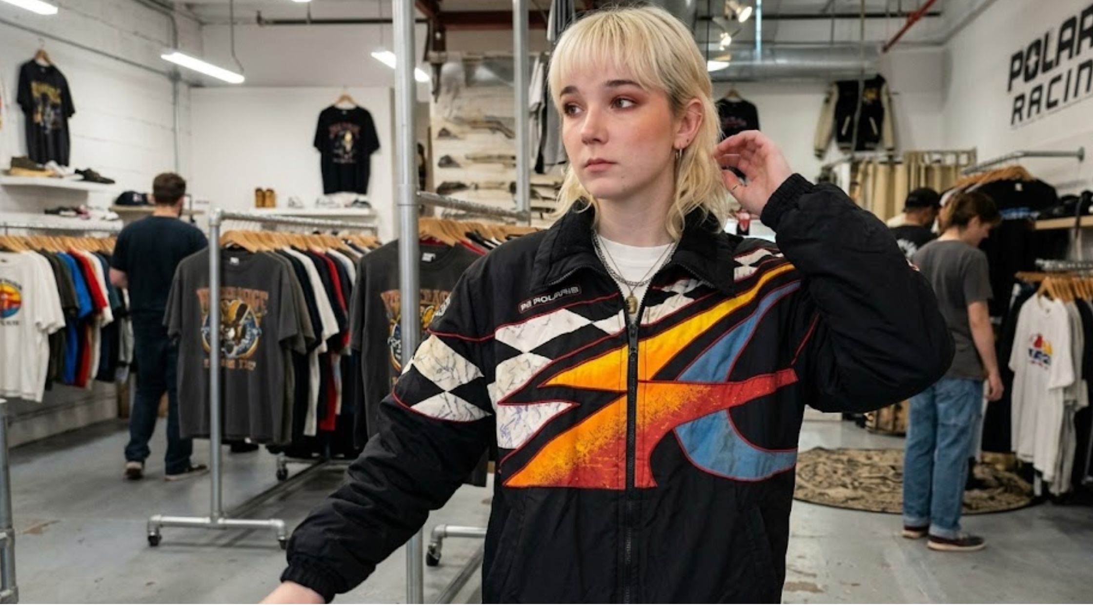How to Style the Off Campus S01 Julia Sarah Stone Racing Jacket & Why Fans Are Looking for This Retro Motorsport Icon